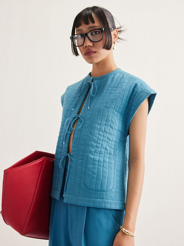 The Tidal Reversible Vest JACKETS SUI