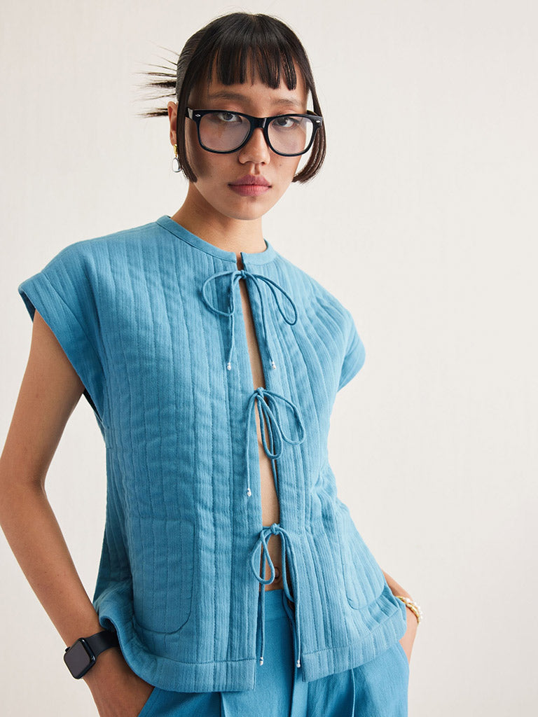 The Tidal Reversible Vest JACKETS SUI